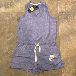 Absolutely adorable lavender Nike jumpsuit. Size small. Never worn. With tags.
